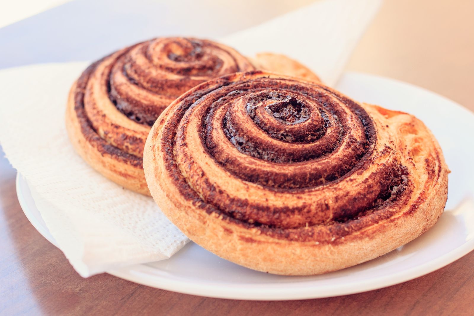 Cinnamon rolls on a white plate