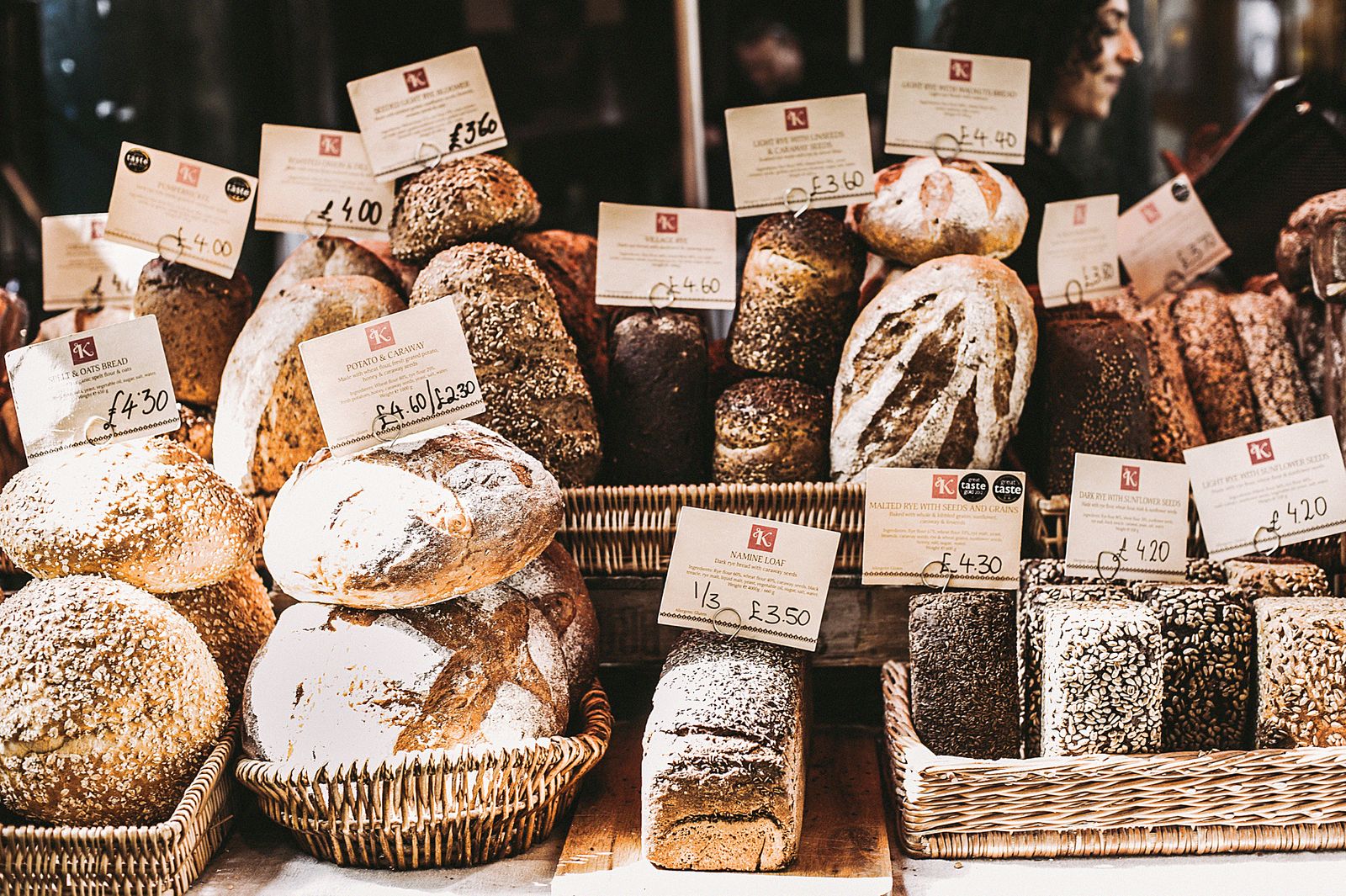 Baskets of bread on the bakery counter
