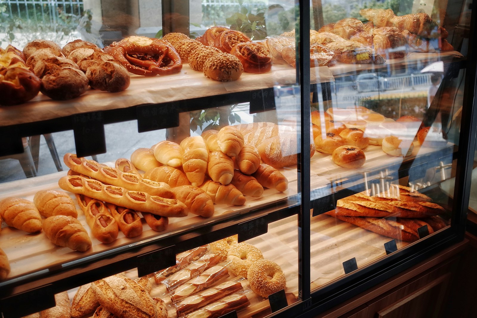 Glass case of breads and pastries